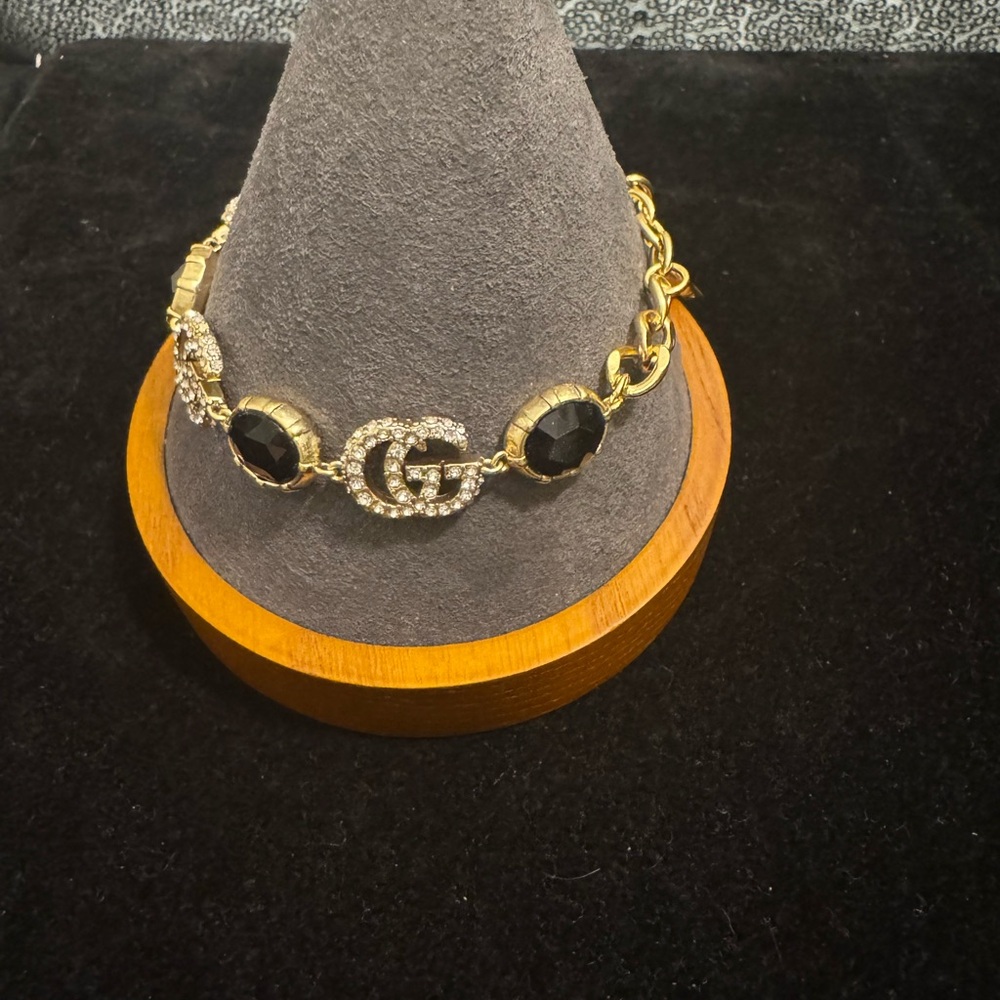 Gucci Gold and Black Bracelet with Iconic Design